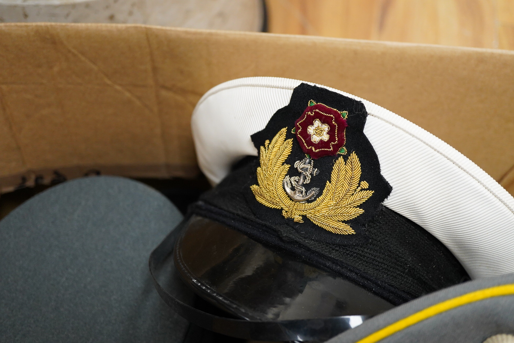 A collection of military and military style caps